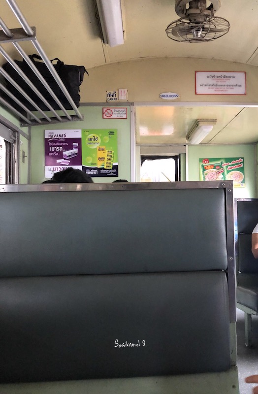 seats inside Thai train.